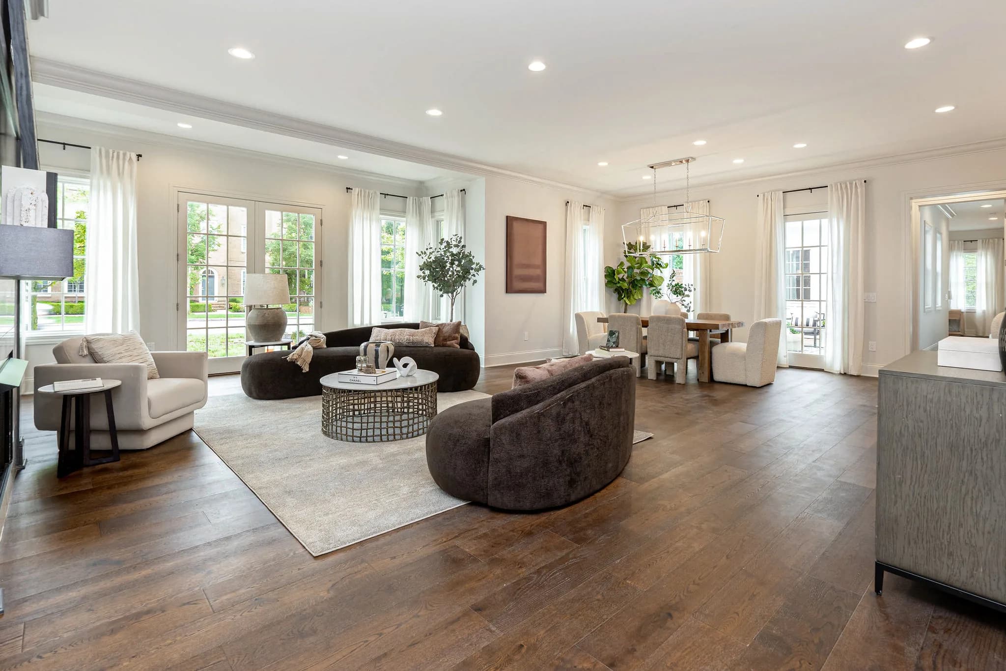 Great room opening to the dining area, light on three sides